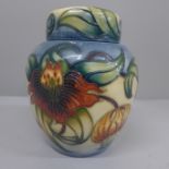 A Moorcroft Anna Lily ginger jar by Nicola Slaney, mark for 2000, 16cm