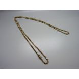 A Victorian yellow metal guard chain, 31.4g, 120cm