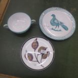 Three items of studio pottery including a plate designed by Mary Fedden, RA