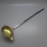 A George III silver gilt ladle, London 1785, incuse duty mark