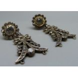 A pair of c1900 paste drop earrings set in silver, 42mm