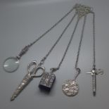 A silver chatelaine, Birmingham 1900, various hallmarks on the tools