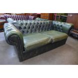 A green leather Chesterfield settee