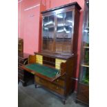 A George IV mahogany secretaire bookcase, with Bramah locks, manner of Gillows, Lancaster, 200cms h,