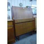 An Elliotts of Newbury teak bureau