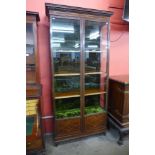 A late Victorian inlaid mahogany two door bookcase, 212cms h, 103cms w, 41cms d