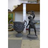 An 18th Century lead garden urn and a figural spelter jardiniere stand