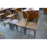 A set of four Ercol Blonde elm and beech Windsor chairs