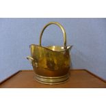 A Victorian brass coal scuttle