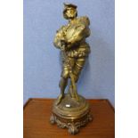 A large continental gilt spelter figure of a soldier, 74cms h