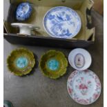 A Russian porcelain bowl on a crimson ground decorated with flowers, a pair of continental