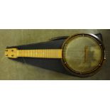 A ukulele banjo, cased