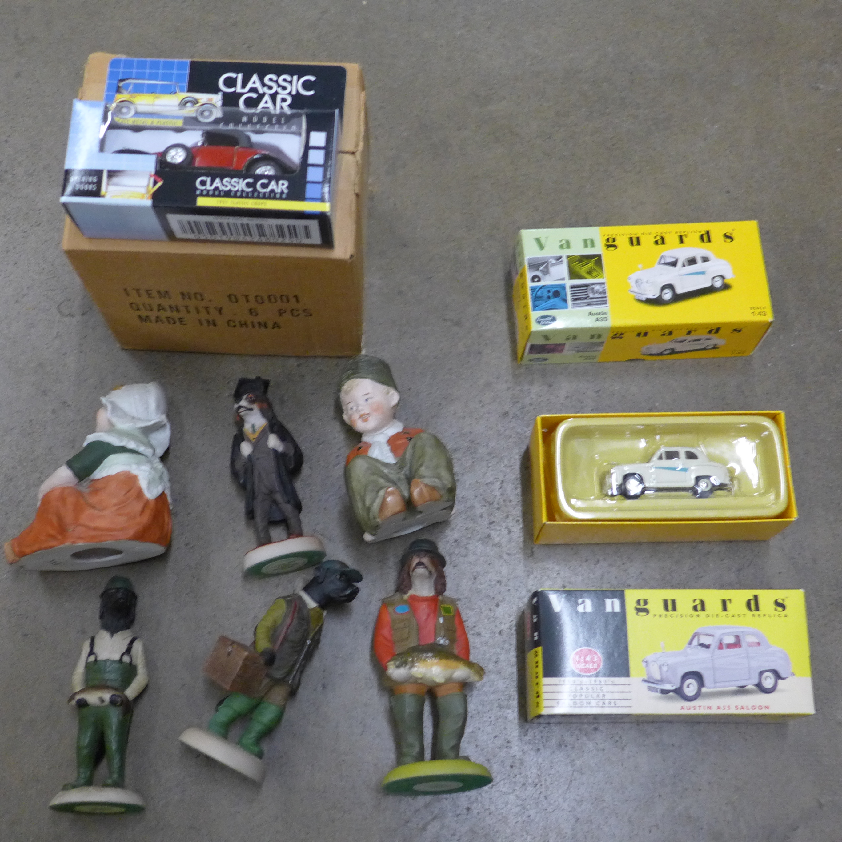 Eight boxed model vehicles and six ceramic figures **PLEASE NOTE THIS LOT IS NOT ELIGIBLE FOR