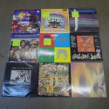 A collection of records including The Beatles, Queen and Santana