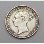 An 1851 sixpence