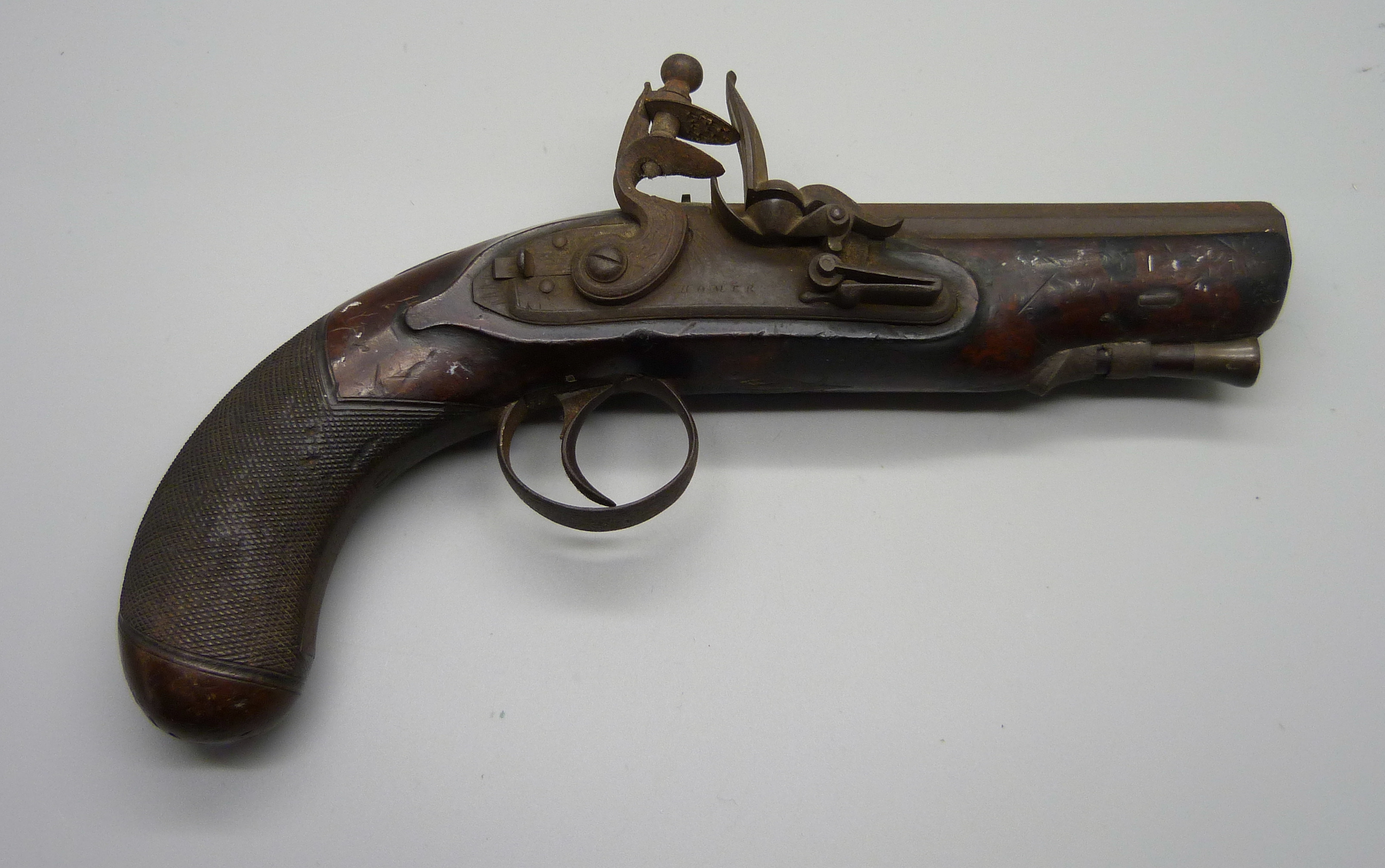 An 18th Century flintlock pistol, 22cm, the barrel engraved 'Police Nottingham'