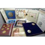 A collection of commemorative crowns and coins and two medals, a cartwheel two-penny and penny