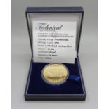 A gold plated silver Tristan de Cunha St. George and The Dragon £5 coin