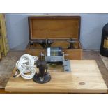 A Lorch watchmaker's lathe with twelve collets, accessories and drive motor, boxed