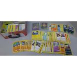 Pokemon cards; a Pokemon collectors tin containing 300 basic Pokemon cards, one full art card in