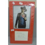 Music Memorabilia, a mounted colour photograph of Peter Doherty signed below - 'Babyshambles Peter