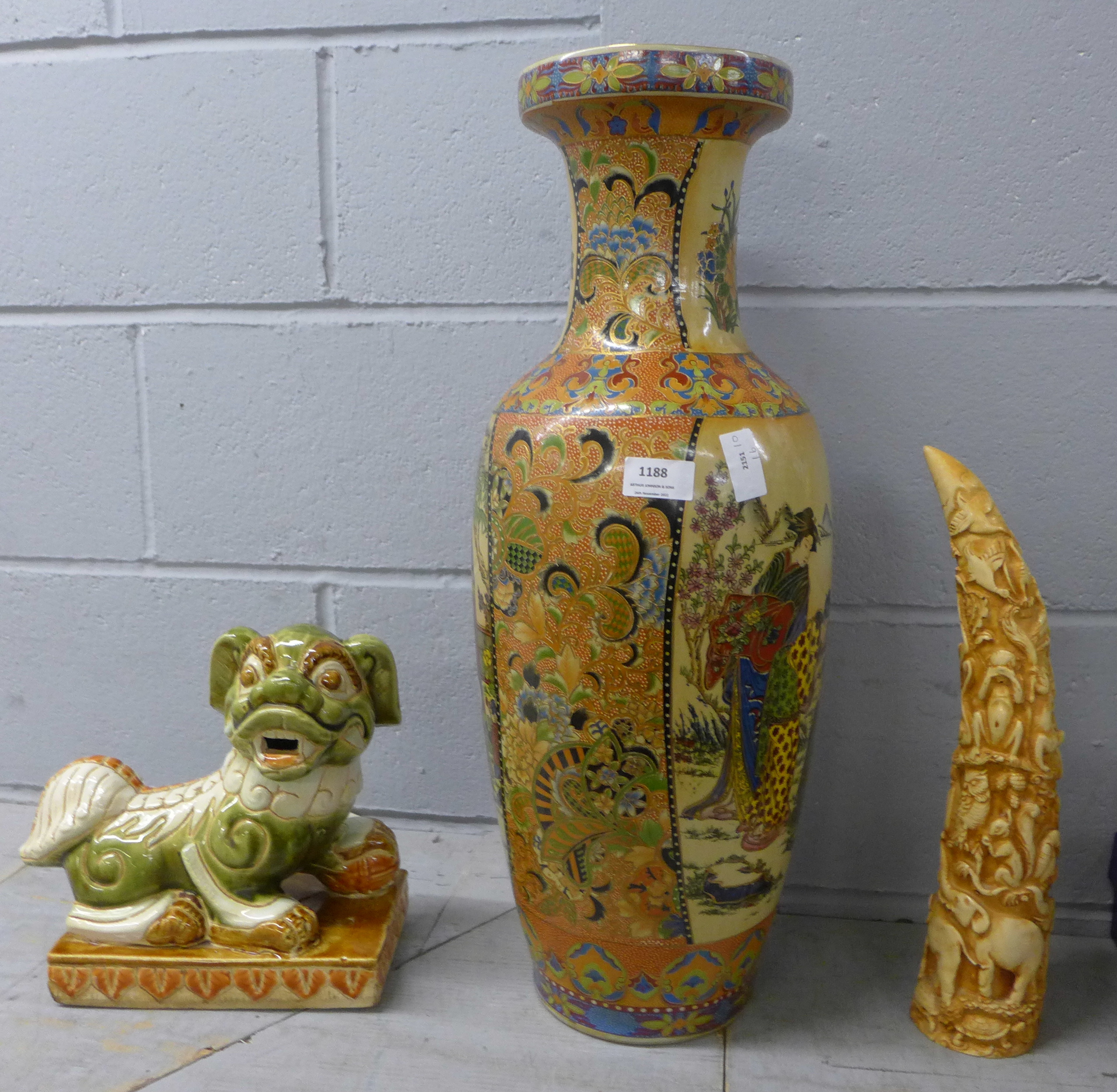 A large oriental vase, a dog of foe and a tusk sculpture **PLEASE NOTE THIS LOT IS NOT ELIGIBLE