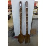 A large wooden spoon and fork