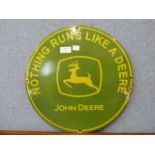 A circular John Deere enamelled sign