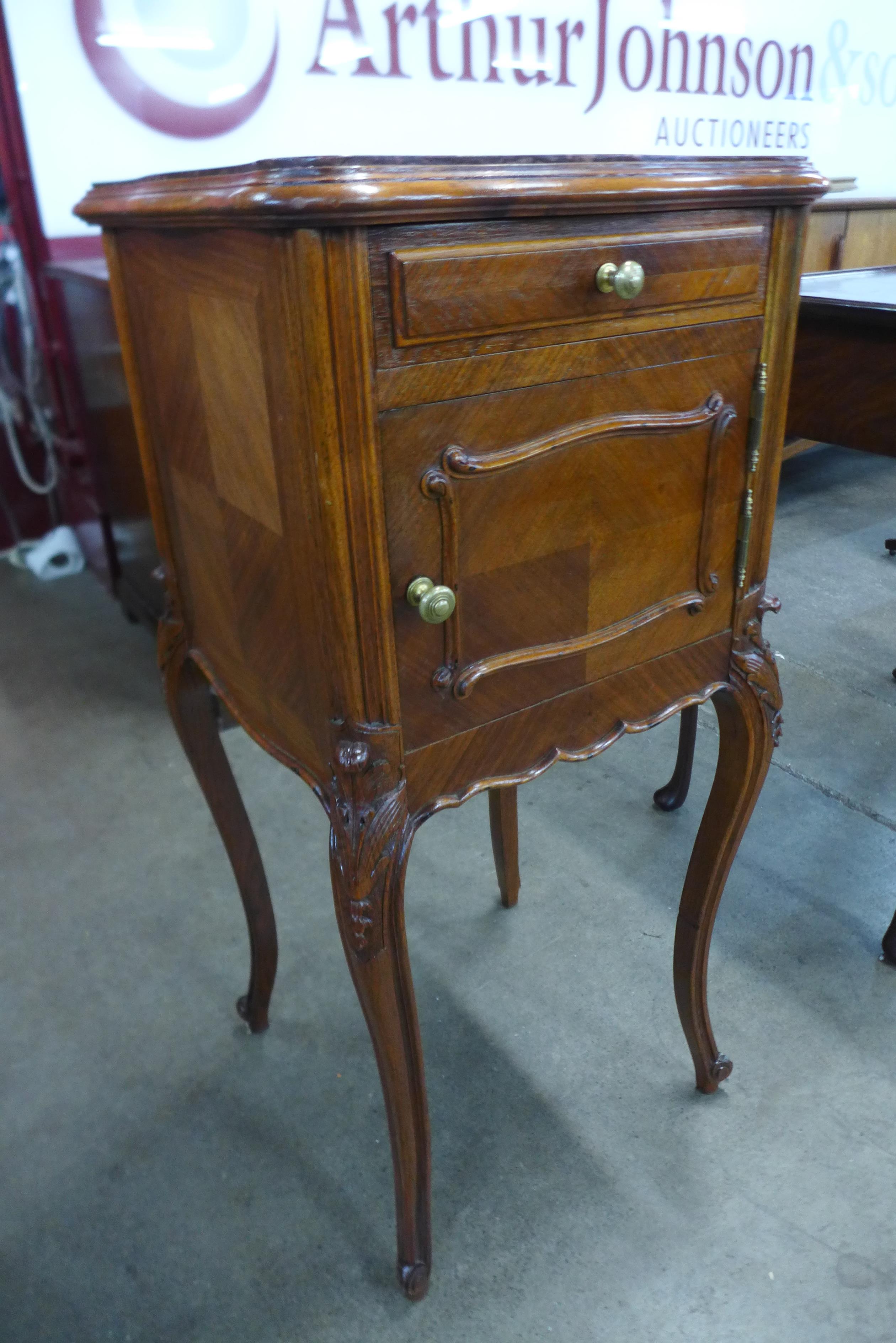 A French mahogany and marble topped table de nuit