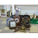 A cuckoo clock, a mahogany aneroid barometer, other clock parts, weights, etc.