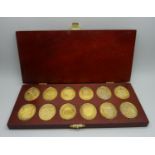 Twelve medallions, The Arms of The Prince and Princess of Wales, boxed and hallmarked, 171g