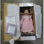 An Ashton-Drake doll, boxed