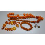 A collection of amber and amber colour jewellery