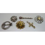 Celtic silver brooches and a citrine set cross and brooch, 59g