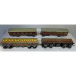Three Hornby 0 gauge LMS carriages and one Hornby O gauge Metropolitan carriage
