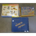 A Meccano Engineering set, No.5, a magnetic football game and a L'avion Looping aeroplane toy