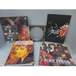 Pink Floyd and David Bowie posters and a David Dowie book
