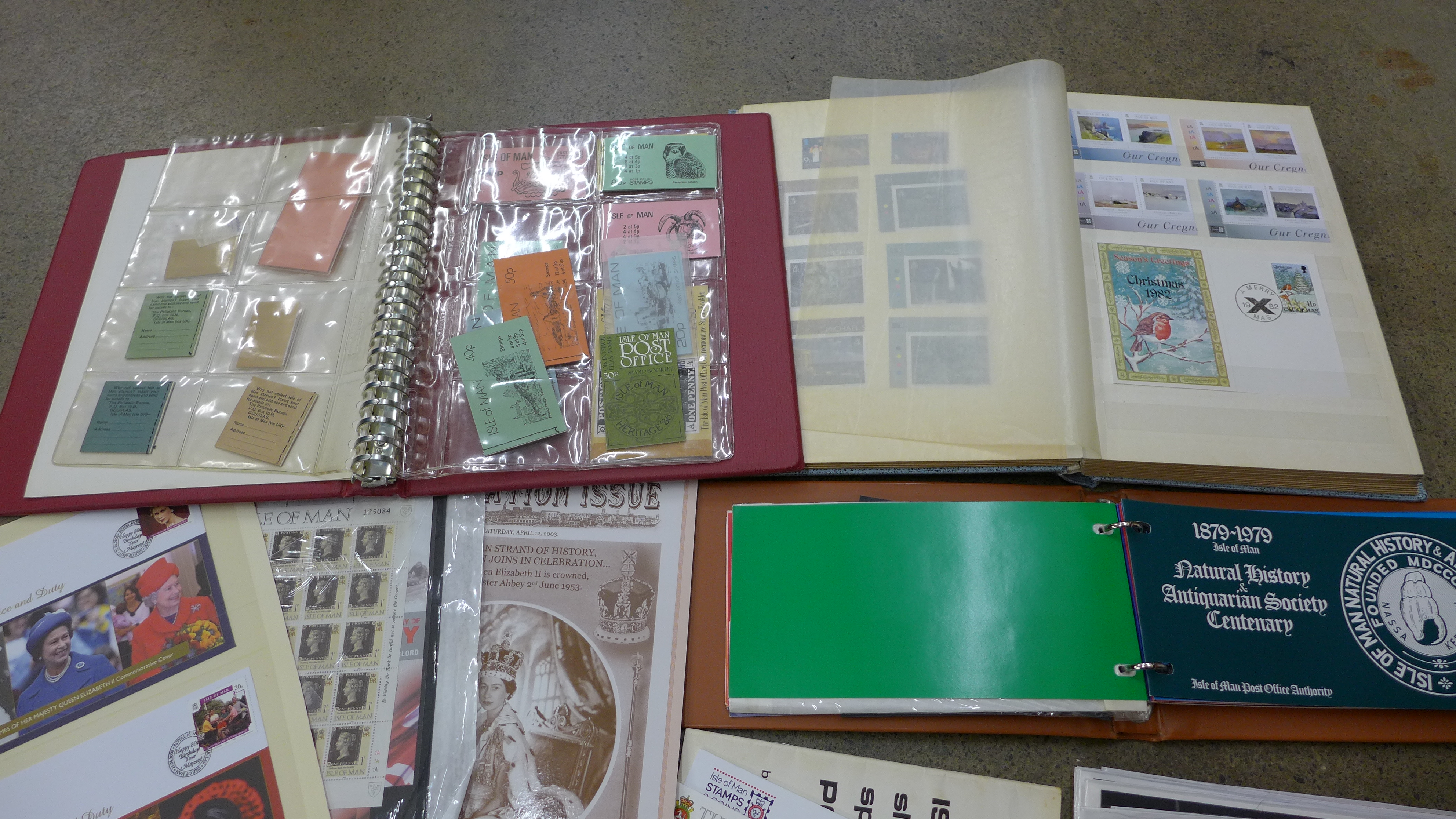 Stamps; a collection of Isle of Man in box with stock book of mint, album of booklets, album of - Image 4 of 4
