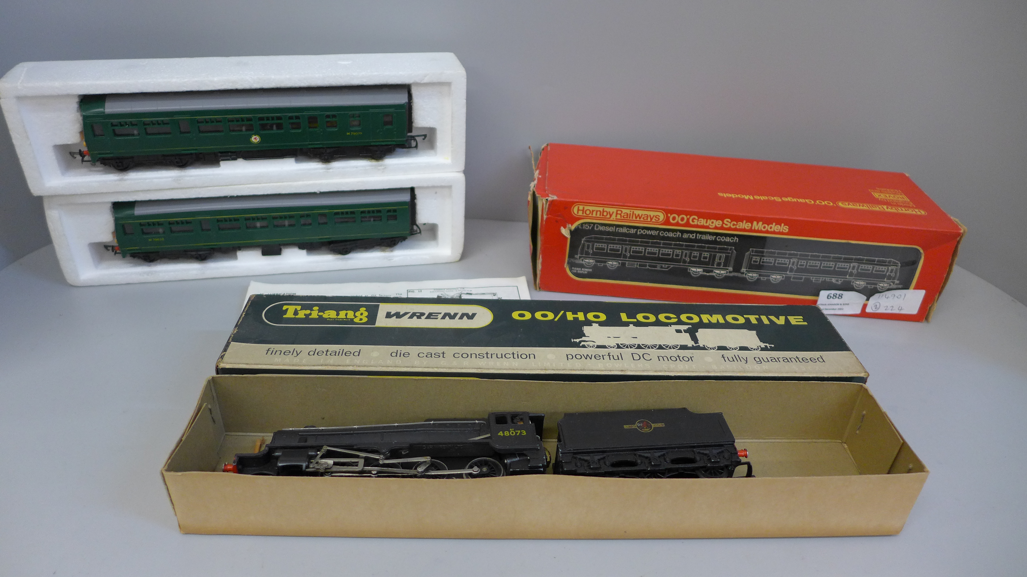 A Tri-ang Wrenn 00 gauge 8F 2-8-0 locomotive and tender and a R.157 diesel railcar power and