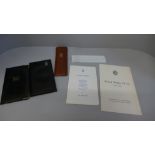 A Rolls-Royce slide rule in leather case, as new, two Rolls-Royce leather note pads, a funeral