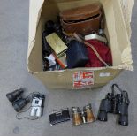 Approximately 20 pairs of assorted magnification and size binoculars and field glasses