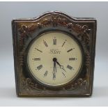 A silver fronted clock