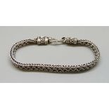 A silver bracelet, 20g