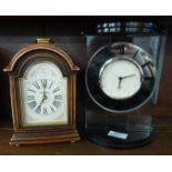 Two battery-powered mantle clocks