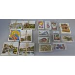 Cigarette cards; sixteen complete sets in small box