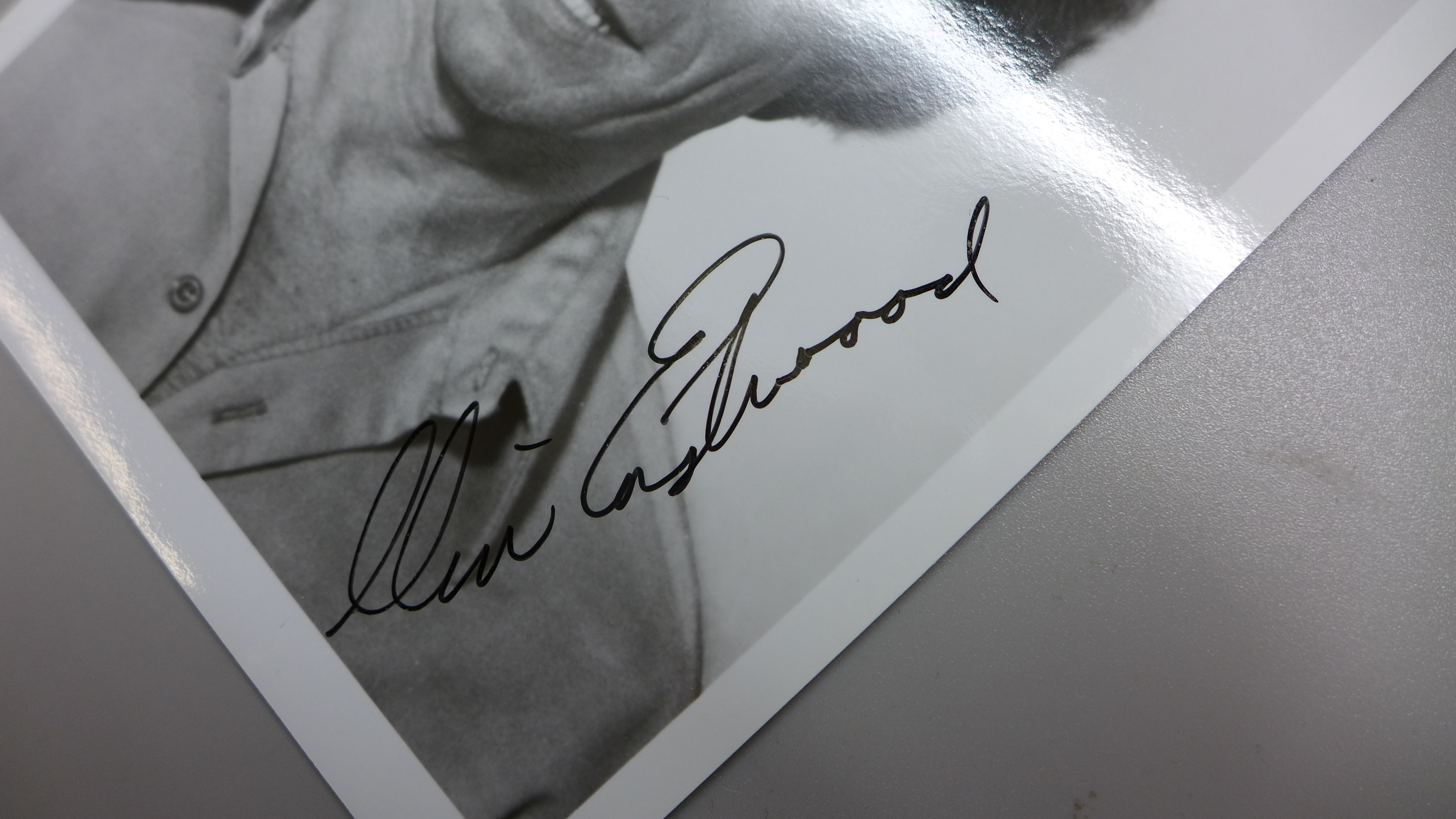 Clint Eastwood: a black and white publicity photo, with original U.S. postage envelope dated Dec - Image 2 of 2