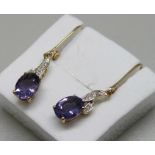 A pair of 9ct gold, tanzanite and diamond drop earrings, 2.1g