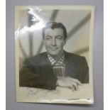 Robert Taylor: a black and white publicity photo, signed in black ink