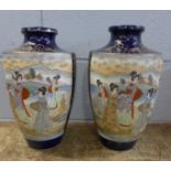 A pair of oriental vases, 31.5cm tall