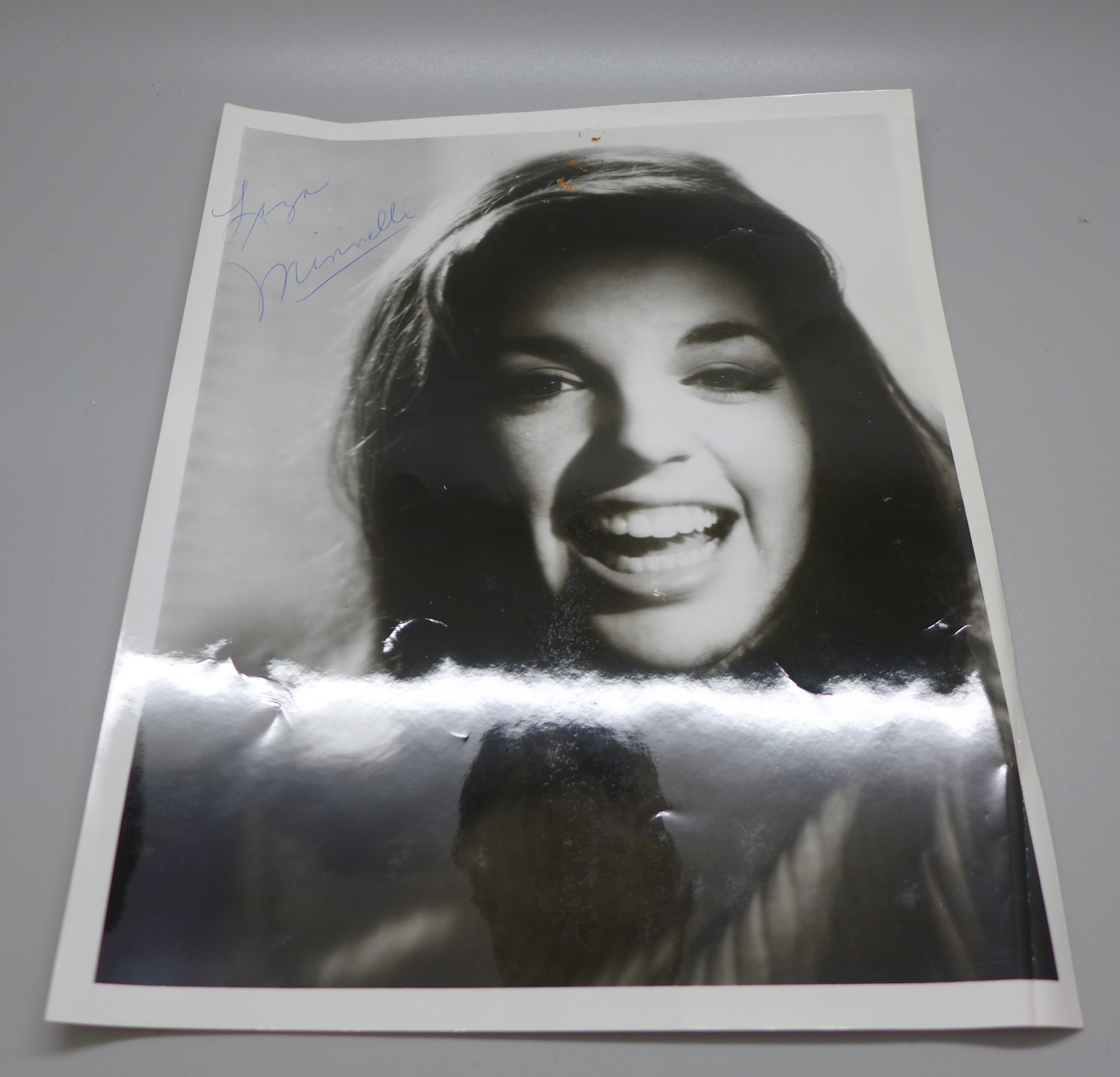 Liza Minnelli: a black and white publicity photo, signed in blue biro, with original postage